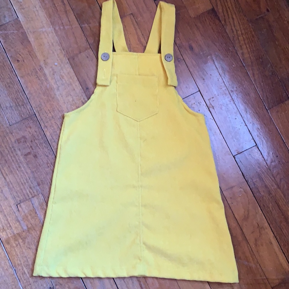 Cute yellow dress! Size Lg, can fit a 5t or 6.